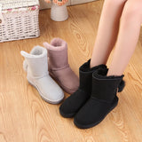 Warm and warm classic crystal series chain and hair ball decoration winter woman boots Sheepskin with wool winter women's shoes
